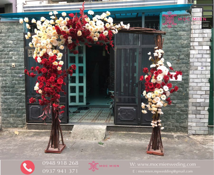 Cổng cưới hoa lụa tông màu đỏ cam giá rẻ tại tphcm