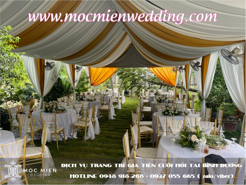 trang-tri-khung-rap-ban-ghe-dam-cuoi-tai-binh-duong-11 Rạp cưới tông màu trắng - vàng đồng
